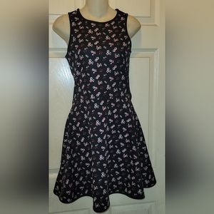 H&M cutout floral mini dress size S EUC Stretch looking fantastic on flirty